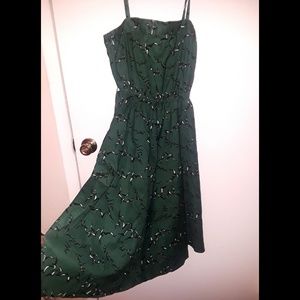 Forest green knee length dress with bird pattern